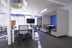 Office collaboration area with acoustic pods