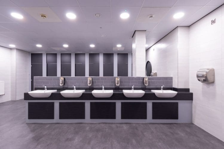 Open plan school washroom interior design with new sanitary ware