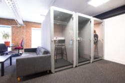 Acoustic coworking office phone booths with acoustic properties