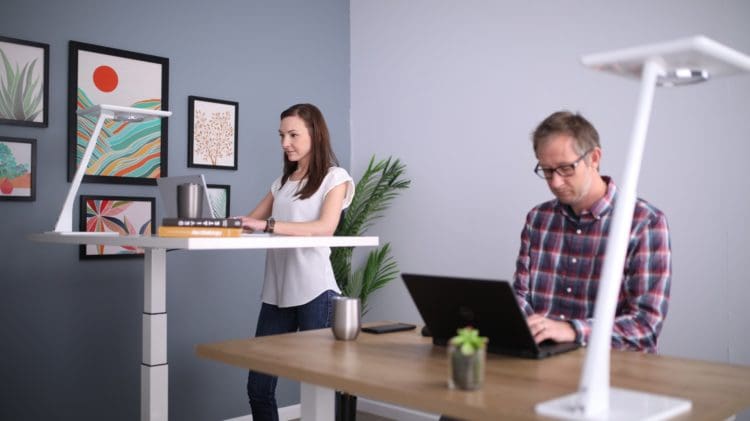 Height adjustable office standing desk for improved posture