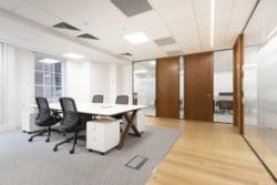 Office interior design with veneer doors and glass fronted meeting rooms