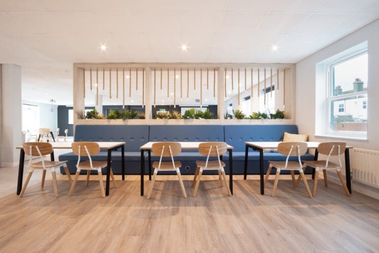 Coffee shop style seating for a coworking office with low level power points
