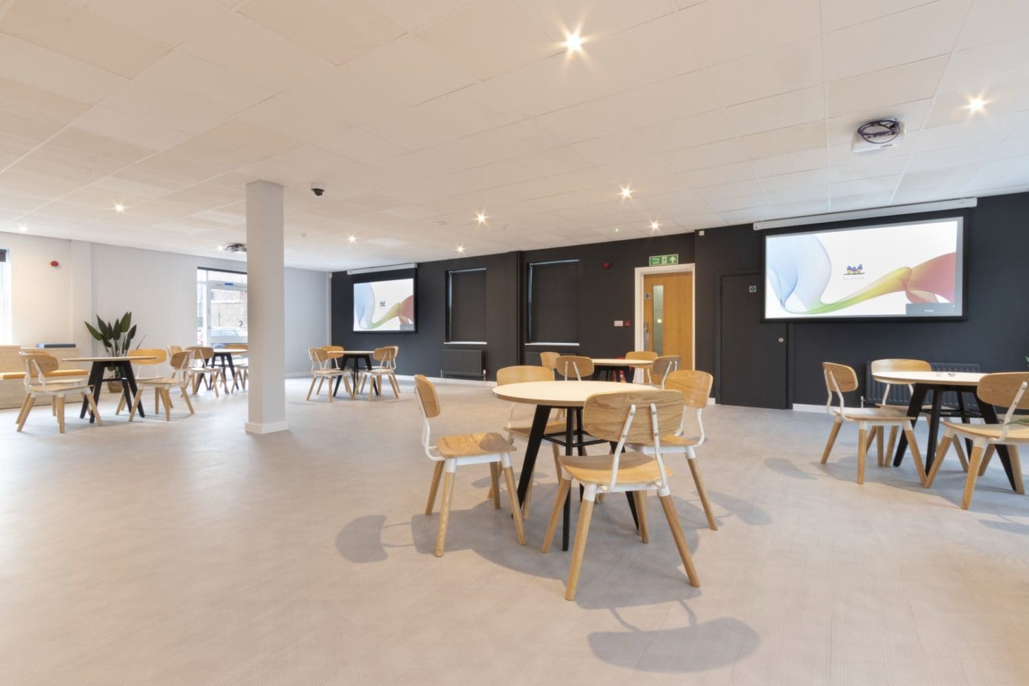 Office presentation area design with projectors and presentation screens