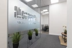 Glass partition and manifestation installed for a CAT B office fit out in Kent