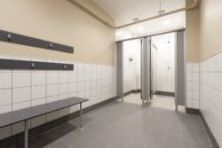 Gym changing room interior design with showers