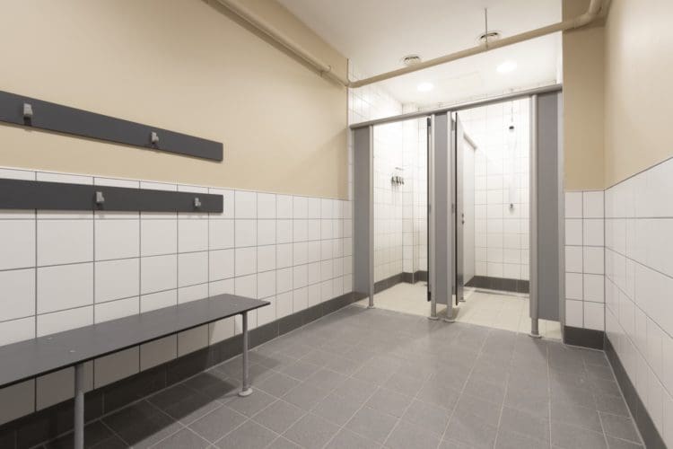 Gym changing room interior design with showers