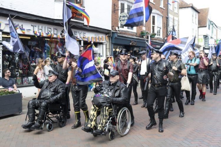 Man in leather outfits at the Pride Canterbury parade 2022