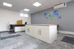 Office interior design with new storage and a wall mural