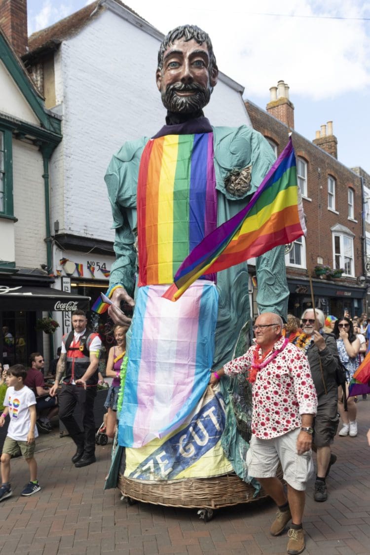 Parade float shaped like a man at Pride Canterbury 2022