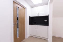 Small office tea point with a white finish