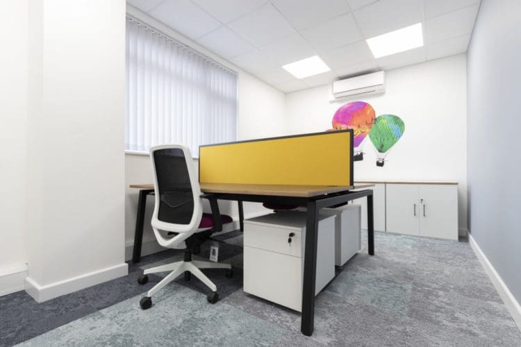 Two person office desk with screen and pedestals