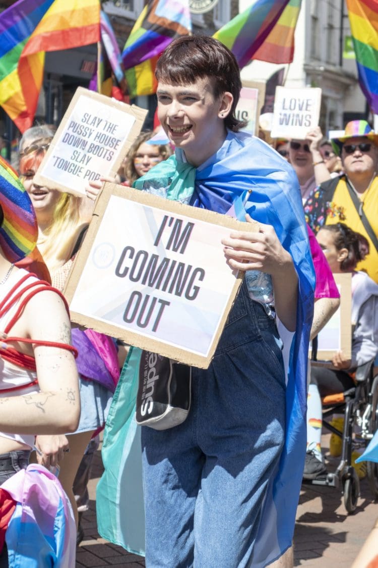 Young man walking in the Pride Canterbury 2022 parade