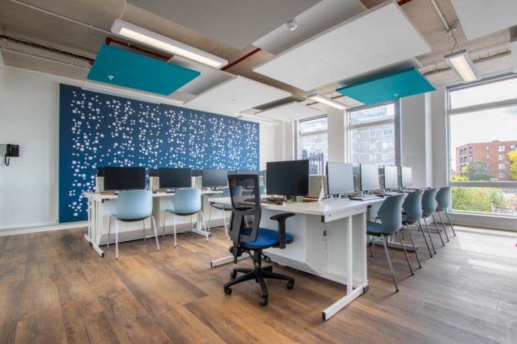 ICT classroom interior design with an LED feature wall and new furniture