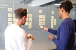 Office workers being collaborative