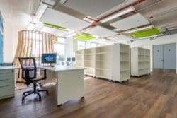 School library interiors with bespoke shelving and ceiling acoustics