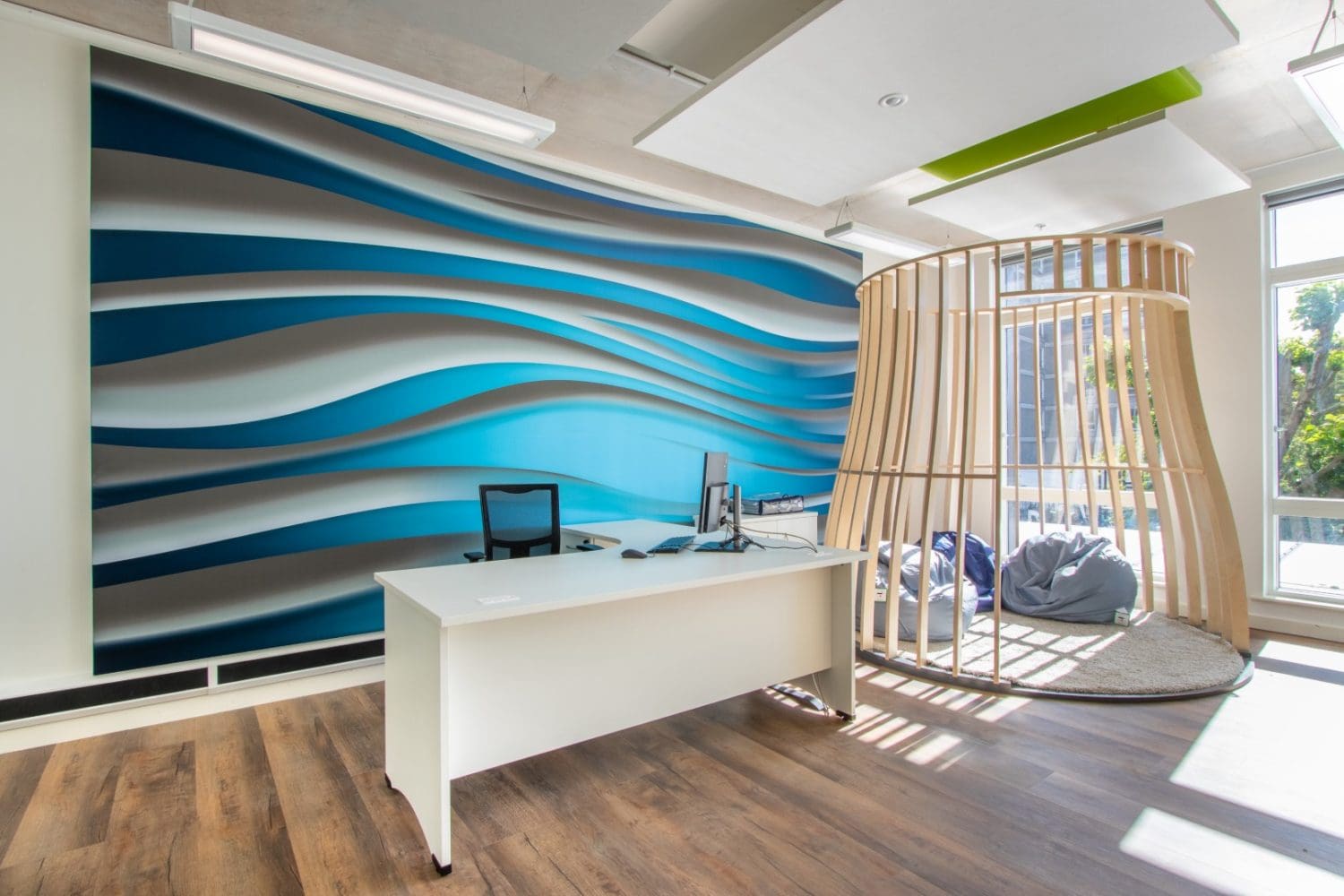 Wave feature wall installed for a school library design and refurbishment in London