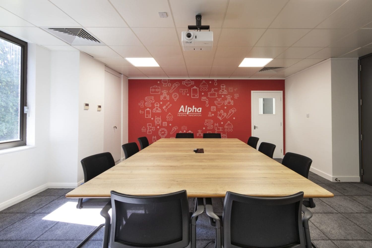 Boiler installation company office training room with feature wall