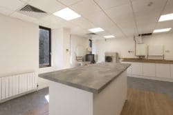 Training room island with concrete effect worktop