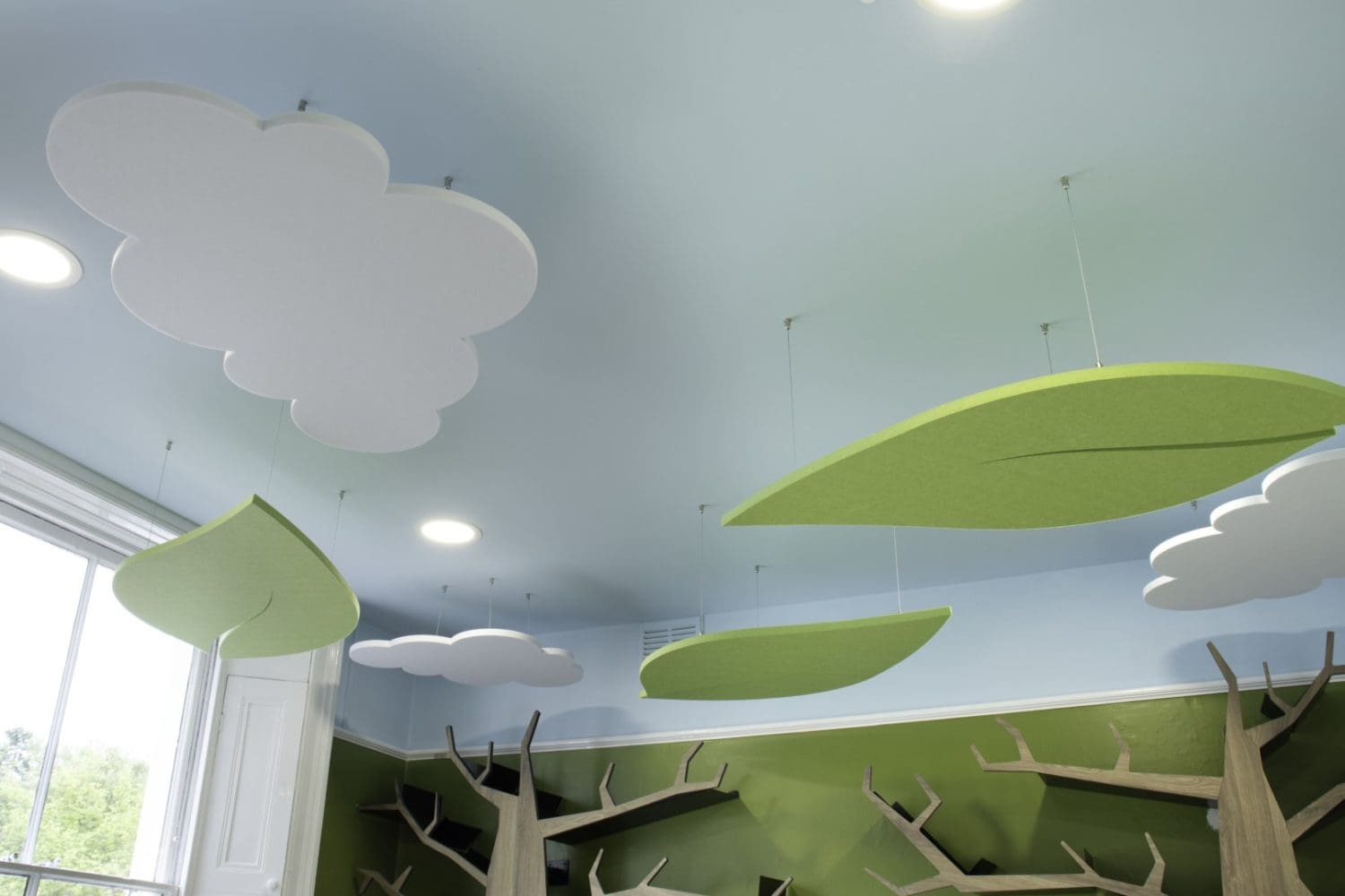 Autumn themed hanging ceiling acoustics with leaves and clouds