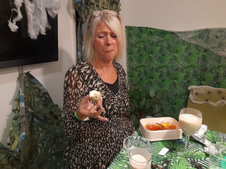 Carolyne from Rap Interiors eating an egg with a grimace