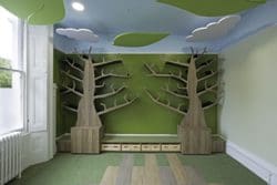 Forest feature wall installed for a school library refurbishment in London