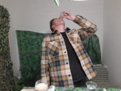 The big Jimbowski downing a disgusting fishy drink for charity