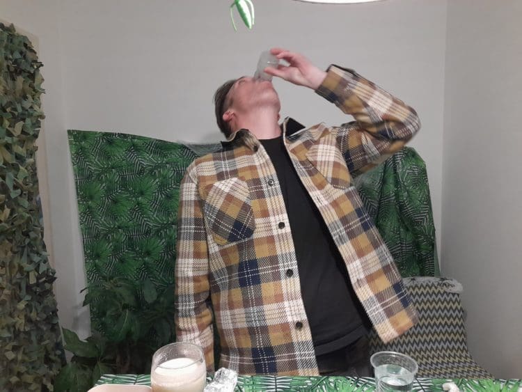 The big Jimbowski downing a disgusting fishy drink for charity