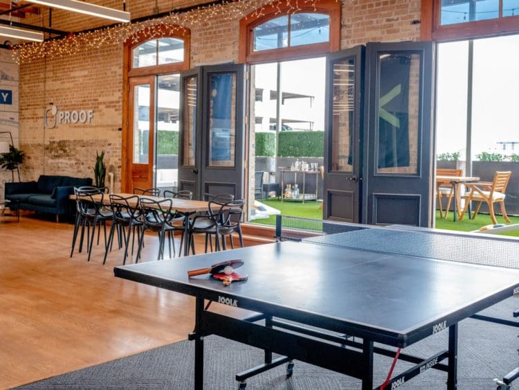 Office with ping pong table and terrace for a human-centric design