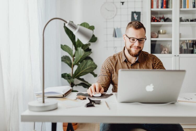 Positive self esteem for employee working in home office.