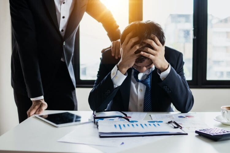 Stressed employee based on office wellbeing statistics.