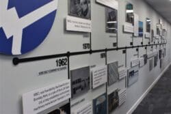 Corporate company branded timeline wall graphic for office interior design project at Wire Belt in Sittingbourne, Kent.