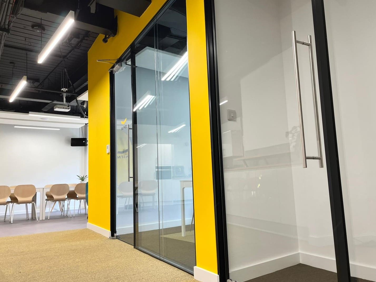 Glazed doors for meeting room in office fit out project.
