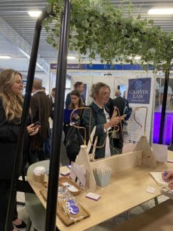 Friends and colleagues enjoying being at the rap interiors stand