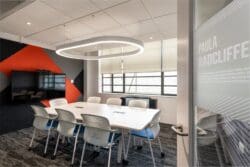 Contemporary office boardroom design with feature halo lighting in an office refurbishment London.