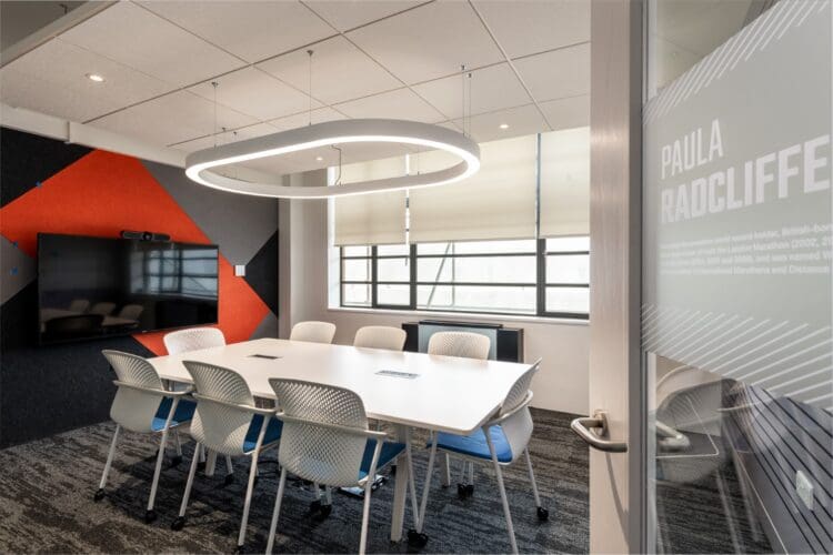 Contemporary office boardroom design with feature halo lighting in an office refurbishment London.