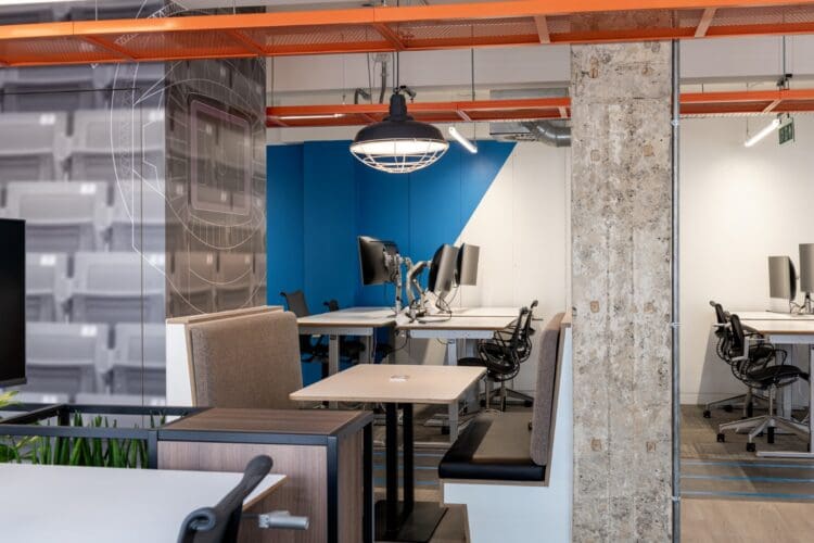 Flexible office work space with booth seating.