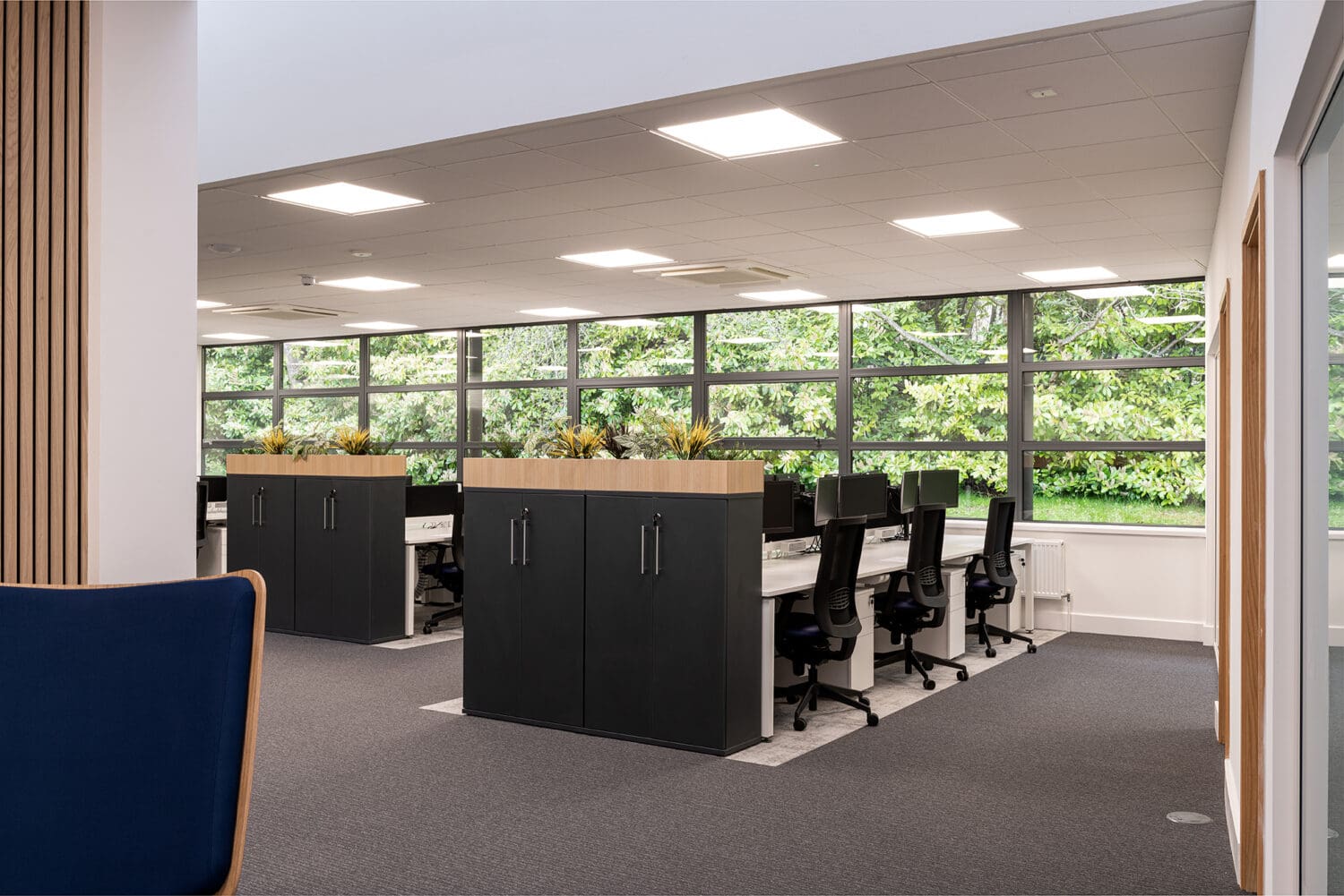 Open plan office layout with office furniture solutions.