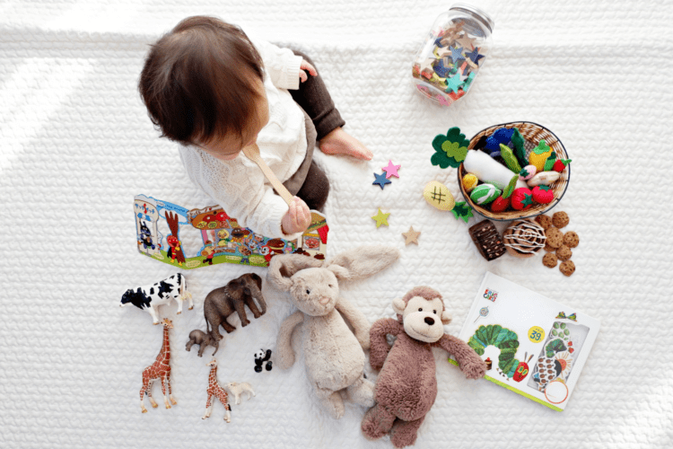 Toddler playing with toys.