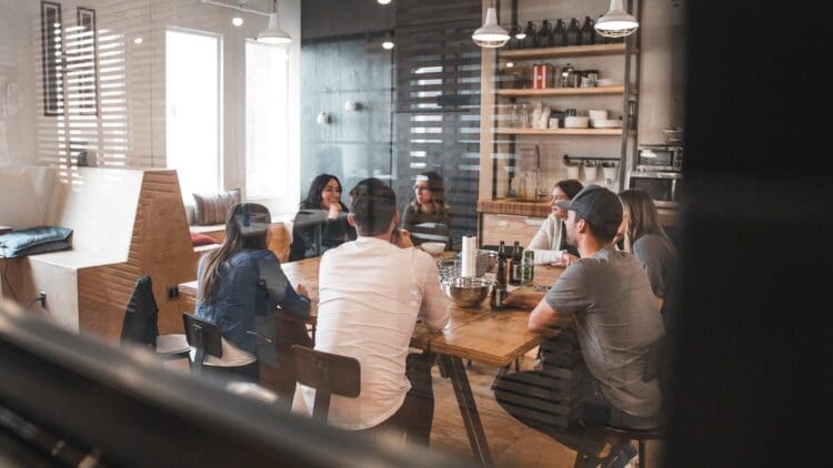 Office collaboration space in modern office interior design scheme.