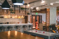 Modern office facilities with breakout space and gaming area.