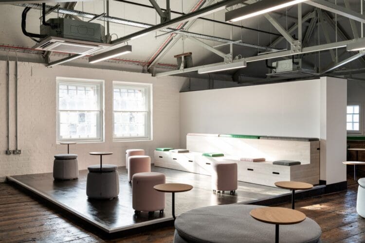 Bleacher seating breakout space in office interior design project. Rap interiors.