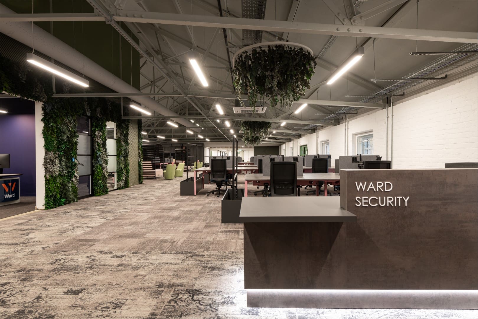Branded office reception area in office interior design project.