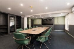 Corporate boardroom design with acoustic panels and high-end boardtable and chairs.- Office designers Rap Interiors