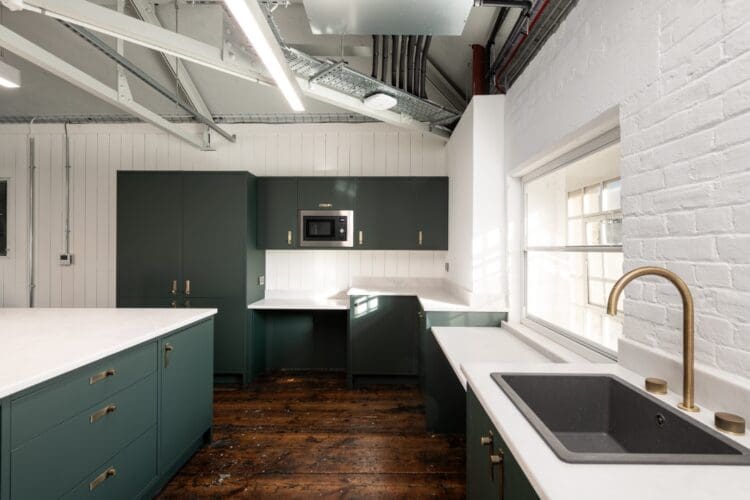 Modern office kitchen area with heritage colours.