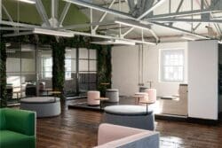 Office breakout space with bleacher seating.