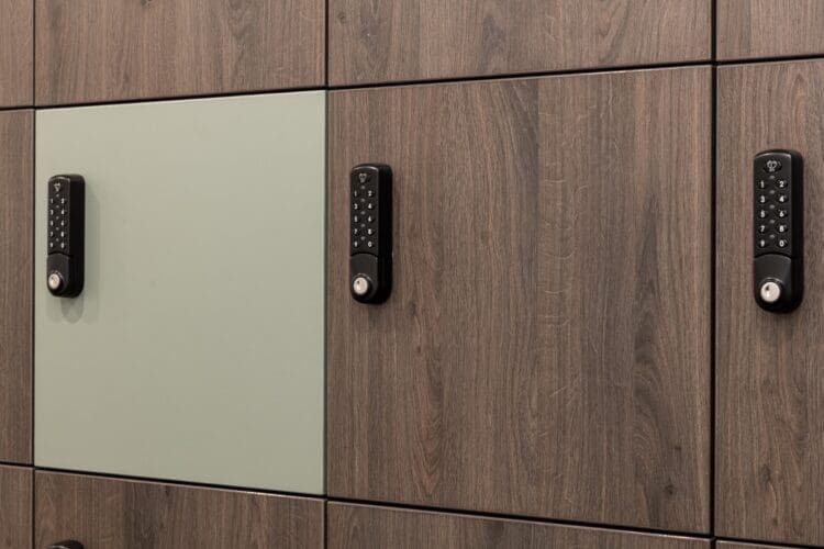 Wasabi green and dark timber laminate surface on locker wall.