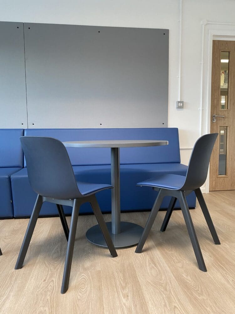 Dining furniture and banquette seating in school staffroom refurbishment.