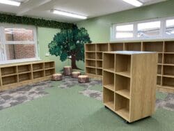 Woodland theme interior design and bespoke shelving for school library refurbishment.
