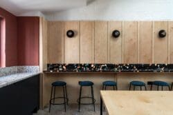 Bespoke ply wall and breakfast bar in office kitchen.