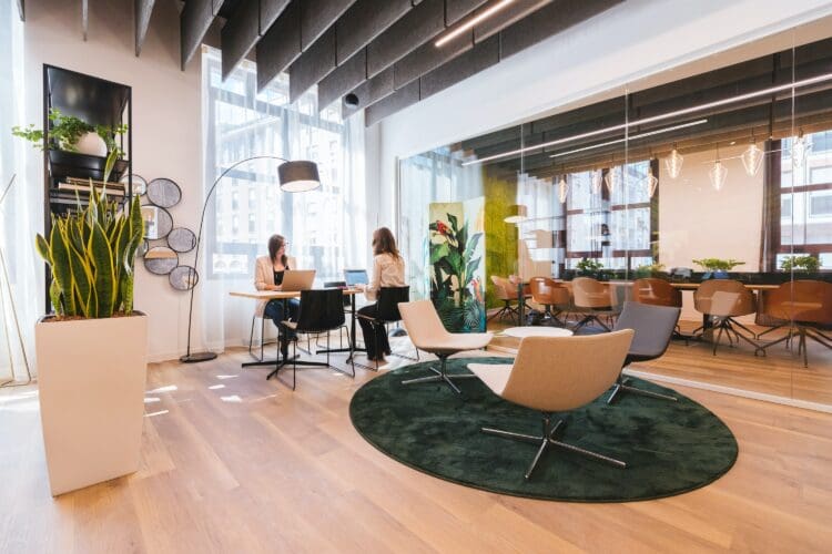 Corporate office interior design with breakout space and glazed boardroom.